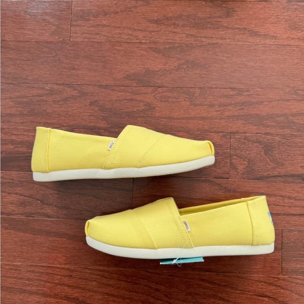 Toms Women's Yellow Slip-On Flats